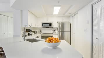 Deluxe Apartment, 3 Bedrooms (Self Check-in with Virtual Front Desk) | Private kitchen | Full-size fridge, microwave, oven, stovetop