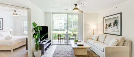 Deluxe Apartment, 3 Bedrooms (Self Check-in with Virtual Front Desk) | Living area | Flat-screen TV