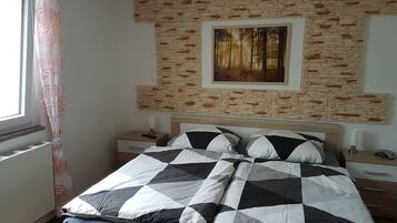 1 dormitorio, tabla de planchar con plancha, cuna de viaje y wifi gratis