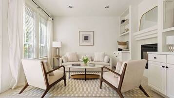 Televisión, chimenea y oficina