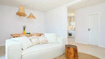 Villa (4 Bedrooms) | Living area | 108-cm TV with cable channels