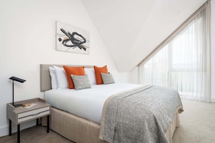 In-room safe, desk, laptop workspace, blackout curtains