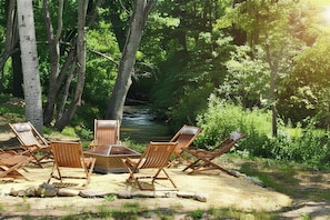 Property grounds - Blue Ridge Haven is packed with luxury and family fun including a Hot Tub, Creekside Fire Pit, Game Room, Private Yard with Playset, and Back Deck with Grill. Your stay is owned and managed by a four time AirBnB Superhost. (Blue Ridge)