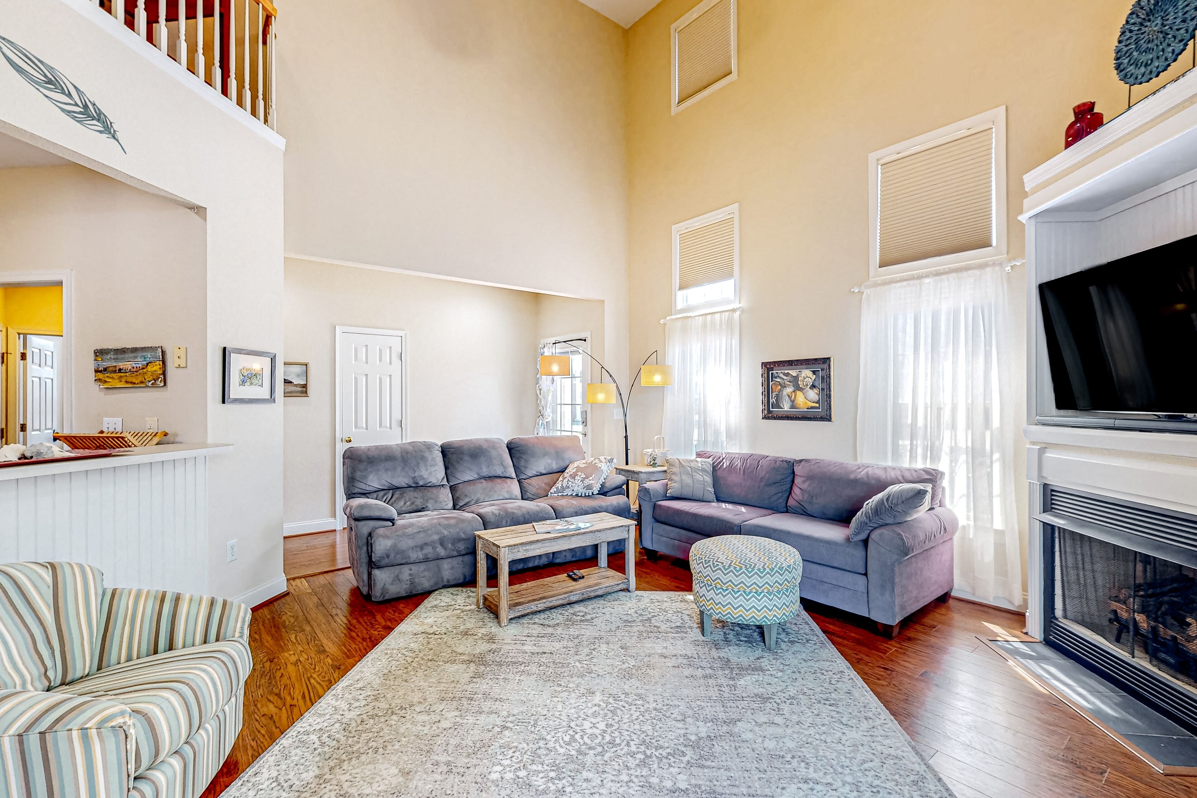 Spacious home close to the beach with community pool, garage, desk, & patio