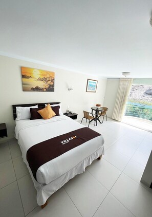 Habitación Deluxe, balcón, vistas al río | Sistema de insonorización y ropa de cama