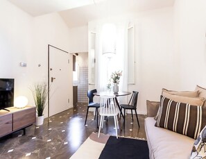 Apartment, Patio | Living area | 35-inch TV with digital channels - Barbieri23 Design by Wonderful Italy (Bologna)