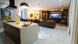 Deluxe Apartment, Kitchen | Living area - Serene Stylish Stay Roof Pool and Lounge (Puerto Vallarta)