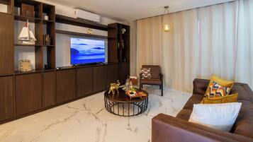 Deluxe Apartment, Kitchen | Living area | TV