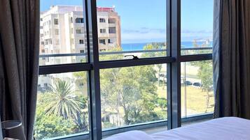 2 bedrooms, desk, iron/ironing board, travel crib