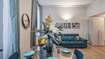 Apartment, Courtyard View | Living area | 35-cm TV with digital channels