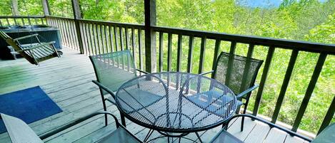 Enjoy a meal or relax on the deck with a view of the surrounding landscape.