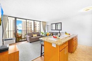 Family Suite, 1 Bedroom, Balcony, Ocean View (0135) | In-room dining - Partial Ocean View Condo with 2 Beds and Parking (Honolulu)
