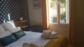 1 bedroom, desk, iron/ironing board, travel cot