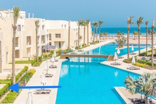 Cozy one bedroom chalet with a private garden to the pool at Mangroovy 