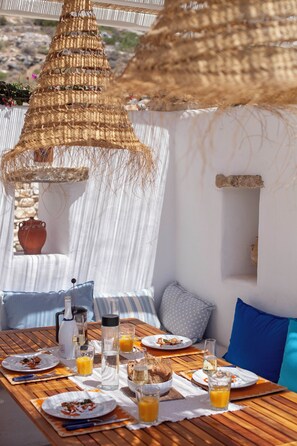 Outdoor dining - 'Villa Botanica' Cycladic family home and gardens with breath taking views (Paros)