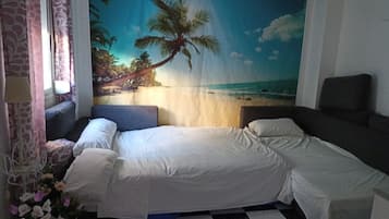 2 slaapkamers, een strijkplank/strijkijzer, gratis wifi, beddengoed