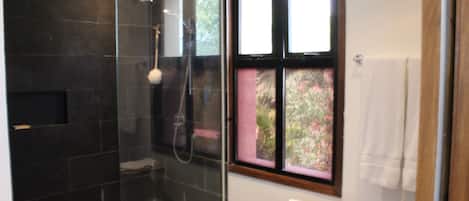 Family Villa, Courtyard View | Bathroom | Shower, free toiletries, hair dryer, towels