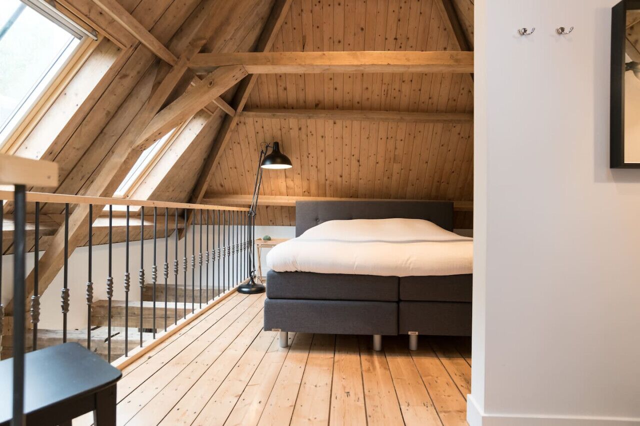 1 bedroom, desk, iron/ironing board, travel crib