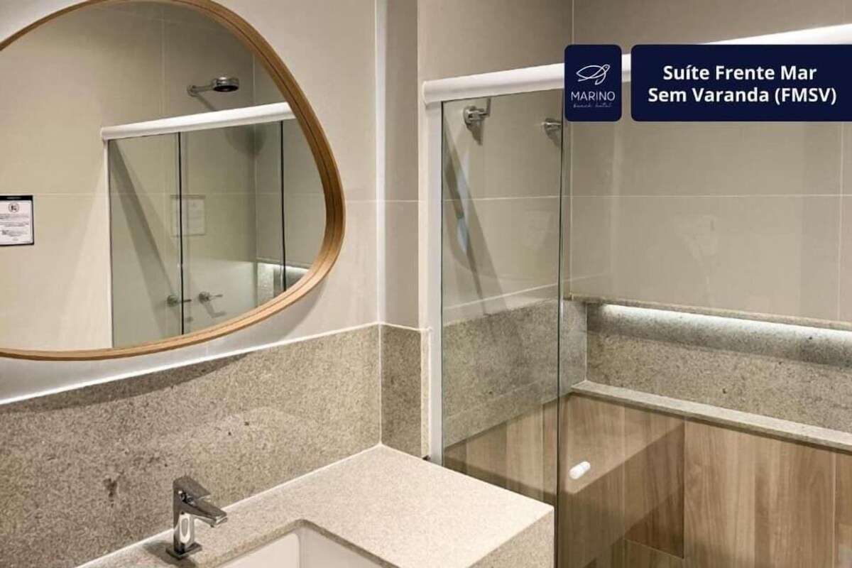 Premium Double Room, Sea View, Beachfront | Bathroom | Shower, hair dryer, towels, soap