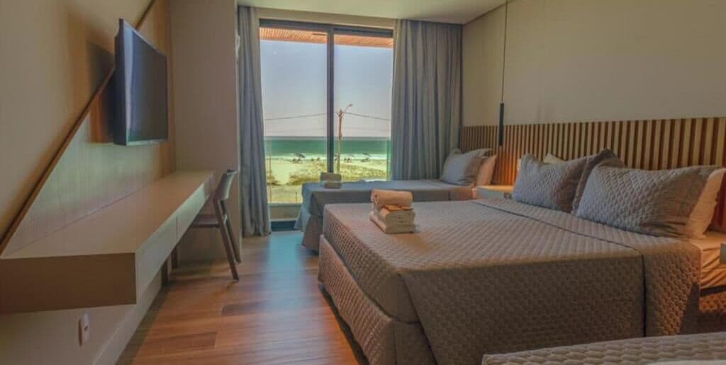 Habitación cuádruple exclusiva | Ropa de cama de alta calidad, camas con pillow-top y minibar 