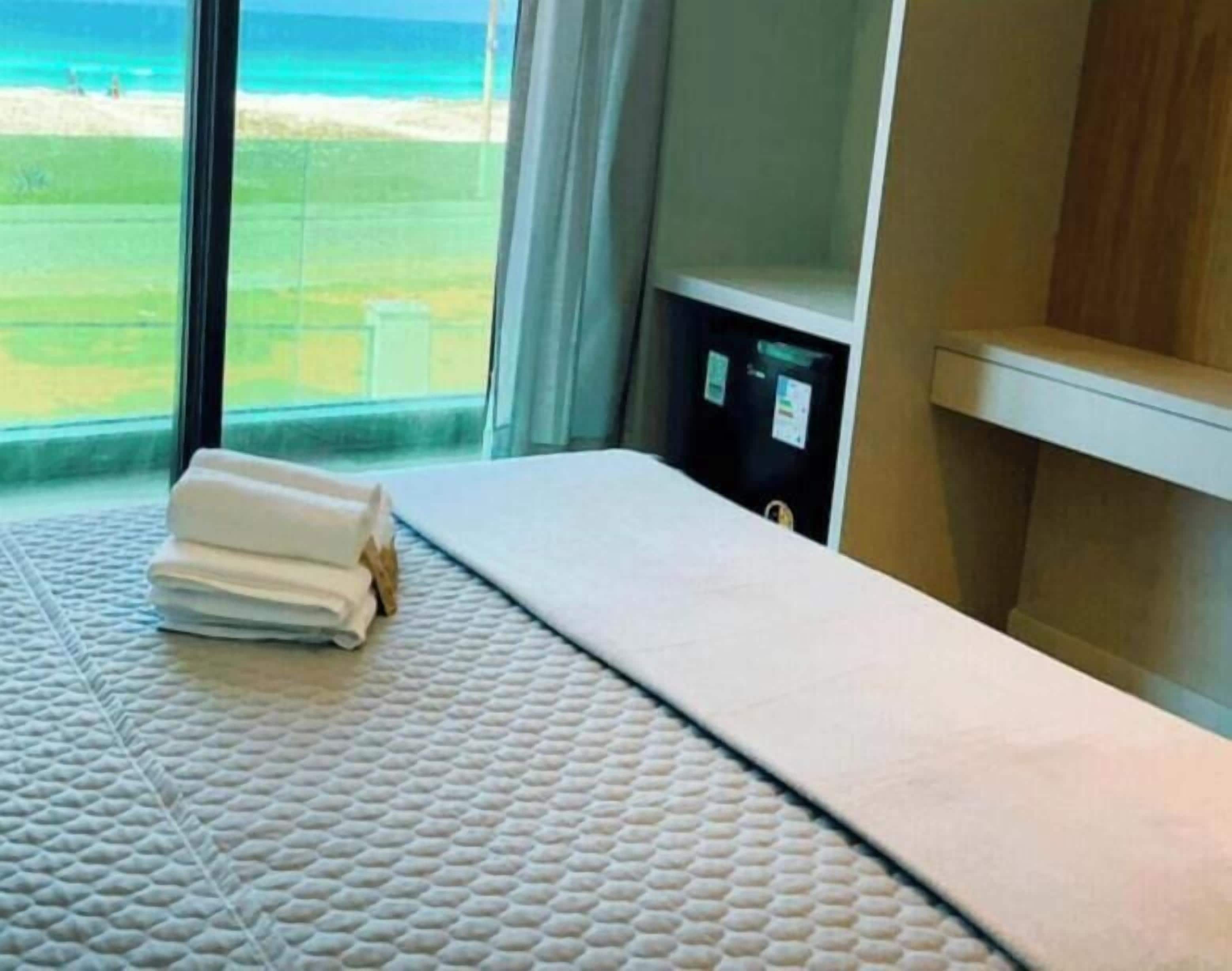 Habitación exclusiva con 2 camas individuales | Ropa de cama de alta calidad, camas con pillow-top y minibar 