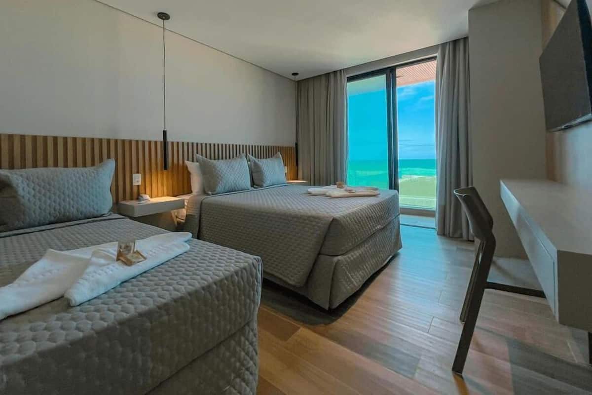Comfort-værelse til 3 personer | Premium-sengetøj, senge med topmadrasser, minibar