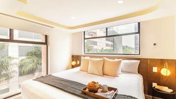 Deluxe Apartment | Hypo-allergenic bedding, in-room safe, individually decorated