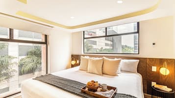 Departamento Deluxe | Ropa de cama hipoalergénica y caja de seguridad en la habitación