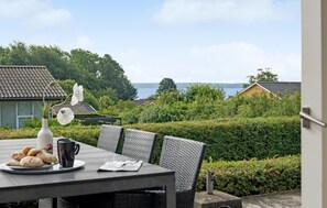 Outdoor dining - 3 bedroom awesome home in Juelsminde (Juelsminde)