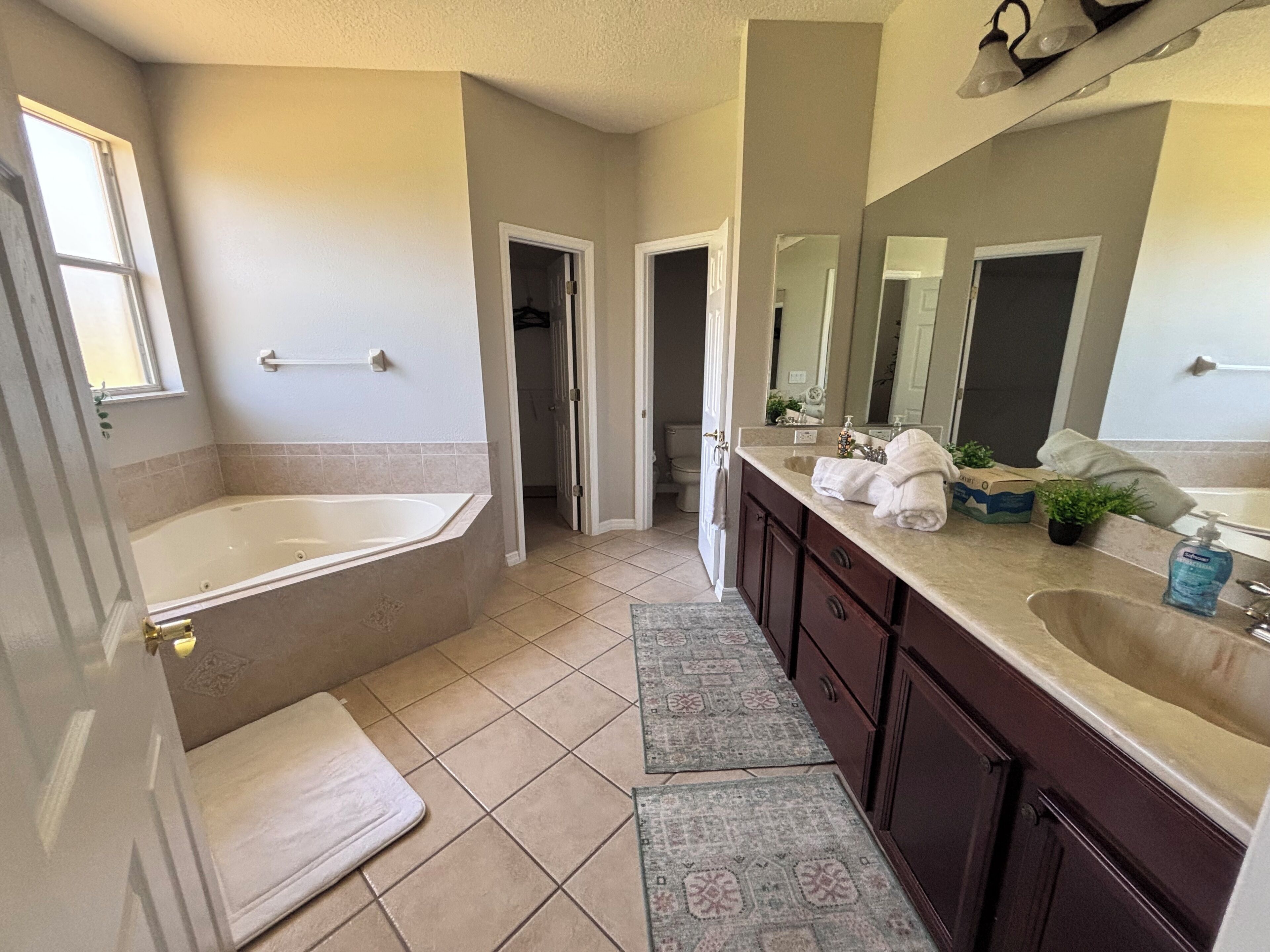 Jetted tub, hair dryer, towels, soap