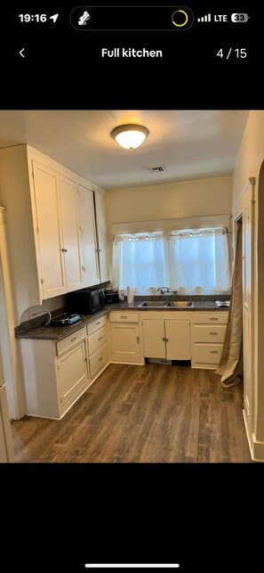 Fridge, microwave, coffee/tea maker, cookware/dishes/utensils - Charming 2 Bedroom Duplex
(Safford)