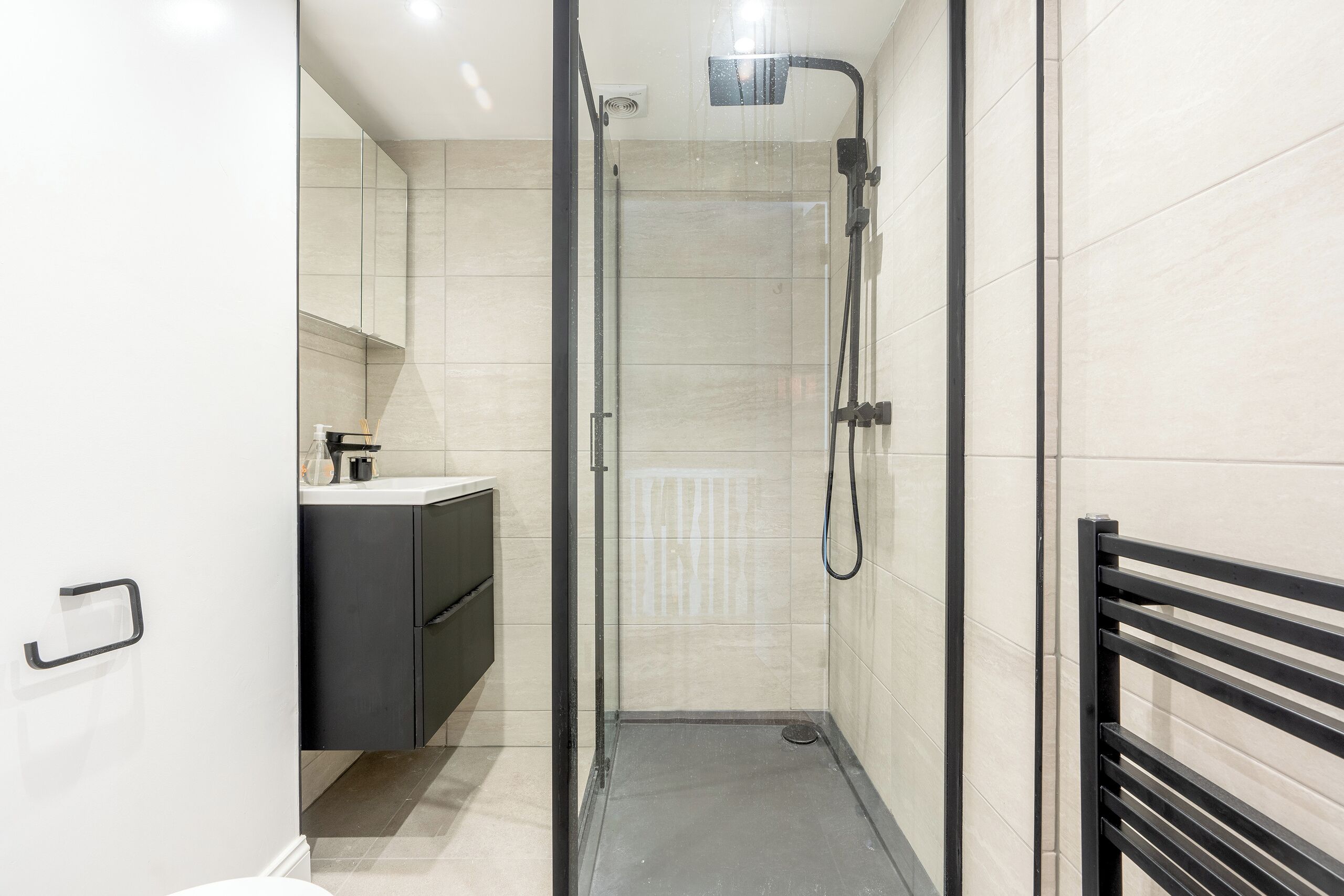 Shower, hair dryer, towels, soap