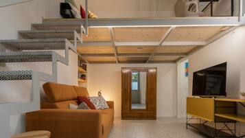 Apartamento urbano | Área de estar | TV de tela plana 32 polegadas com canais a cabo