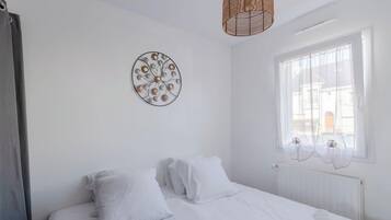 2 slaapkamers, een strijkplank/strijkijzer, wifi, beddengoed