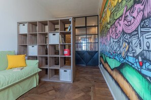 Apartment, Balcony | Living area | 35-inch TV with digital channels