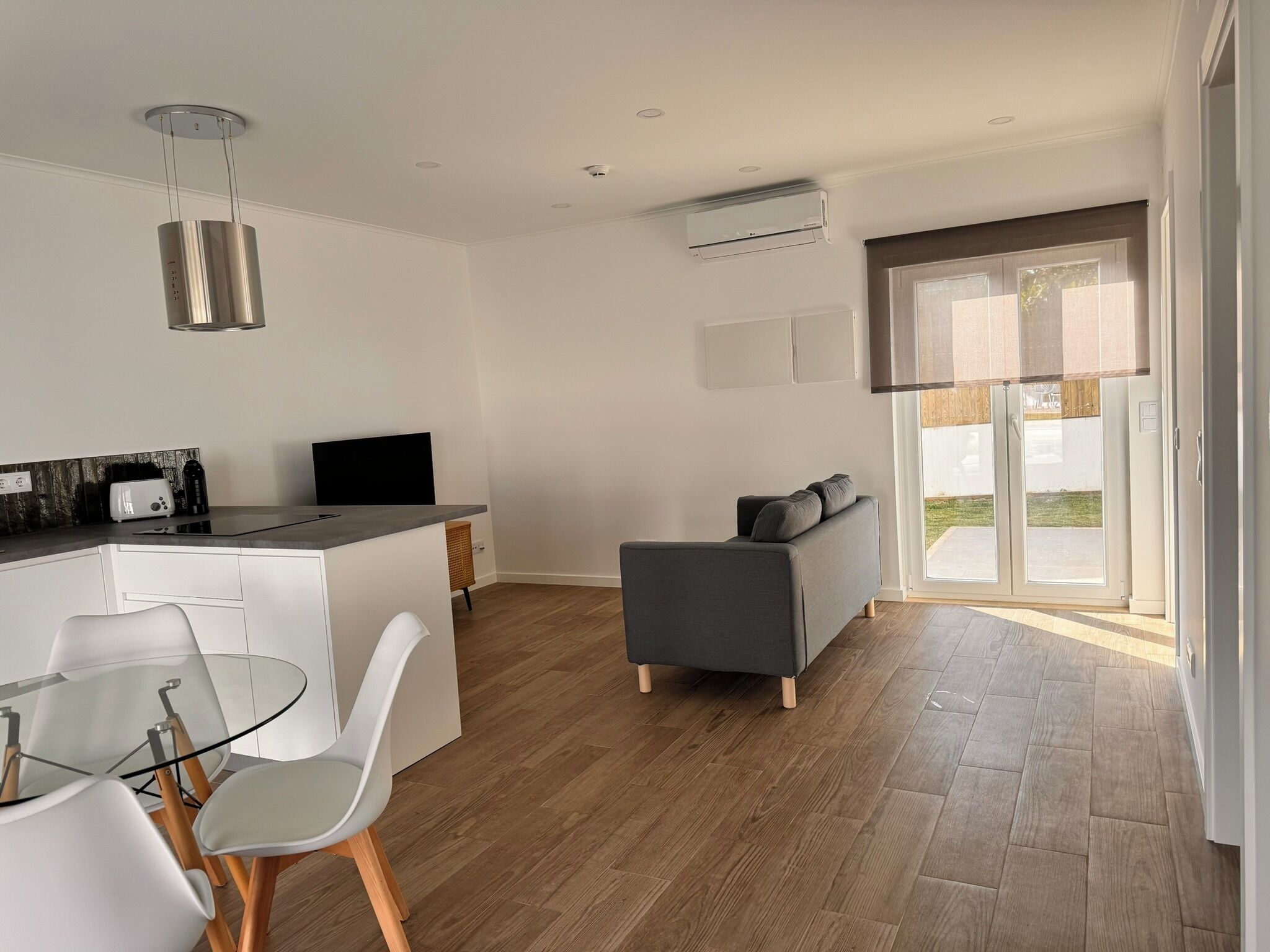 Deluxe Villa, Pool View | Living area | 42-inch Smart TV with cable channels