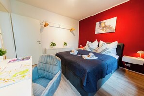 1 bedroom, desk, iron/ironing board, travel cot