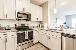 Full-sized fridge, microwave, oven, stovetop - Landing Apartments near North Fort Myers (North Fort Myers)