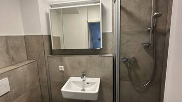 Shower, towels, soap, shampoo