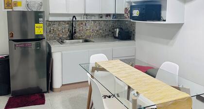A Home Away from Home 43sqm Studio-type condo in Quezon City with Wifi AC