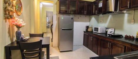 Standard Room, City View | Shared kitchen | Full-sized fridge, microwave, oven, stovetop