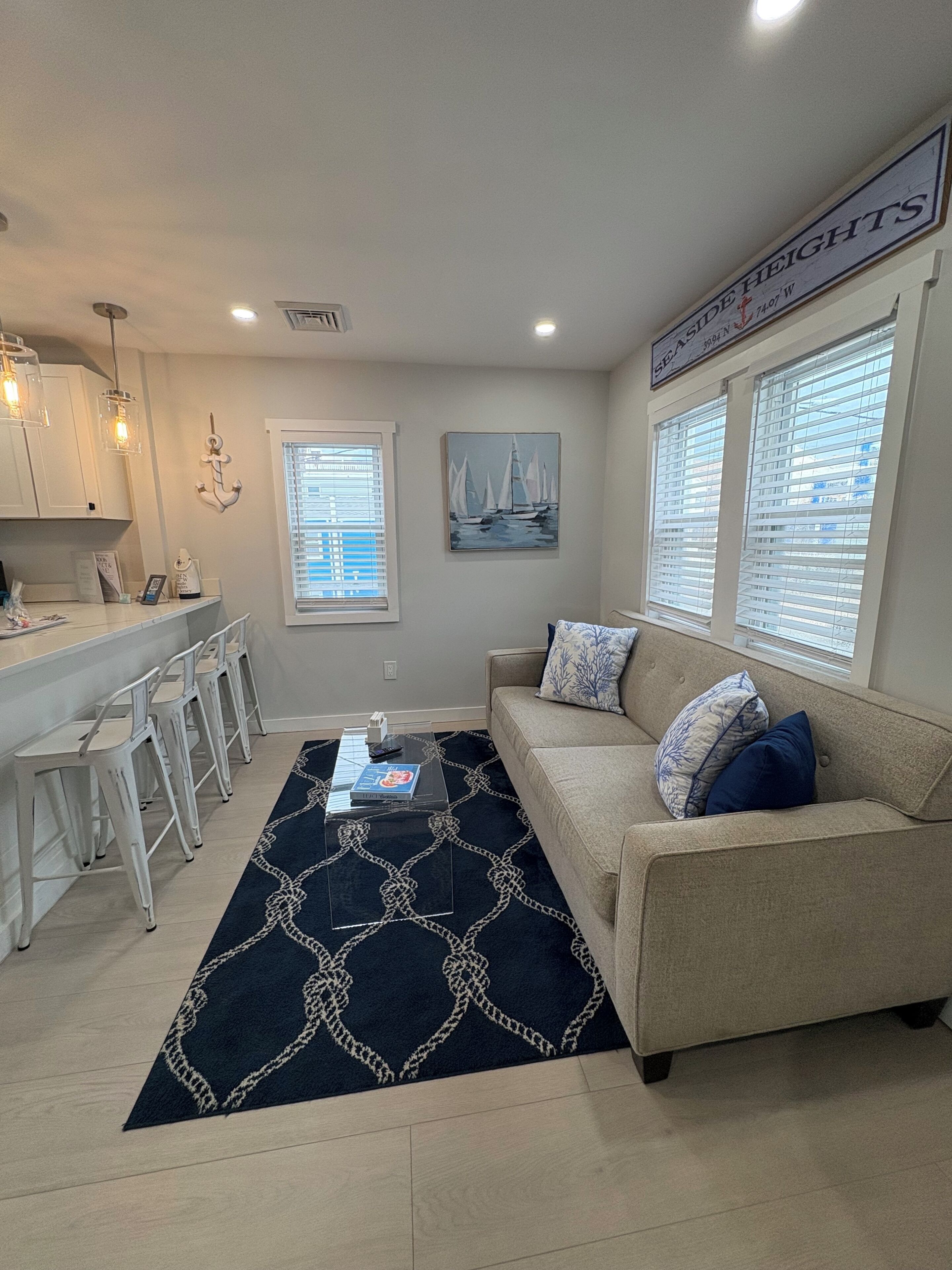 Living room and kitchen counter island that seats 4 people