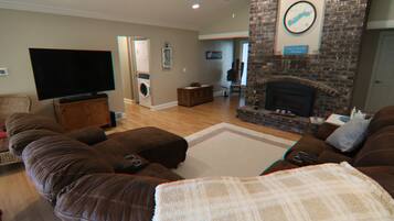 Smart TV, fireplace, DVD player, books