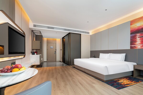 Premium bedding, down duvets, free minibar, laptop workspace