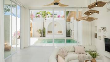 Villa Selene | Living area | 46-inch Smart TV with cable channels