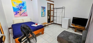 Chambre quadruple Standard, salle de bain privée, vue sur le jardin | Accès au Wi-Fi (inclus)