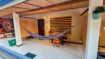 Standard Quadruple Room, Private Bathroom, Garden View | Terrace/patio