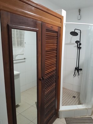 Shower, towels, soap, toilet paper