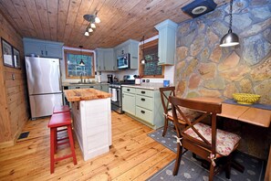 Enjoy cooking in this well-equipped kitchen with appliances and ample counter space.
