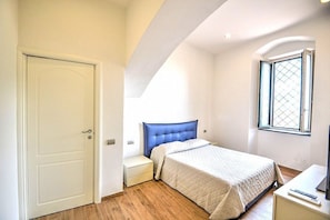 2 dormitorios, tabla de planchar con plancha, wifi gratis y ropa de cama